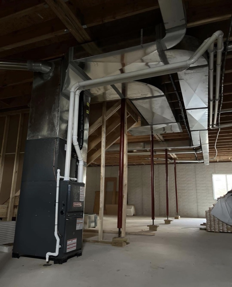 Basement furnace connected to new sheet-metal ductwork in a Niles, MI area home